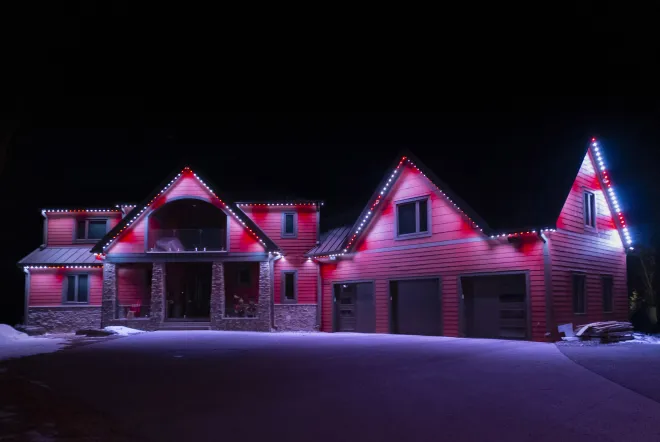 Permanent Gemstone Lights set to red and white Canada pattern in East St. Paul, MB