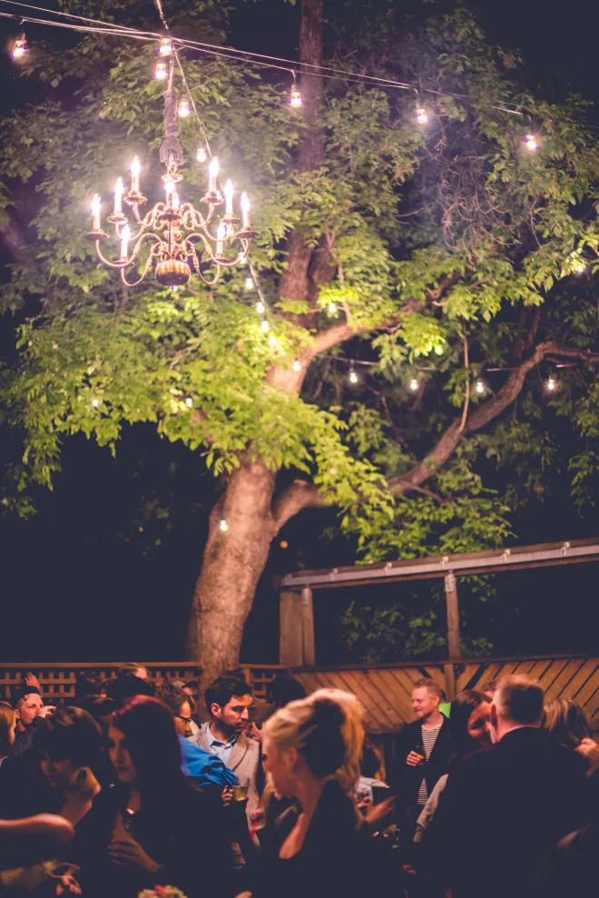 Wedding lighting installed in a backyard in Winnipeg, MB